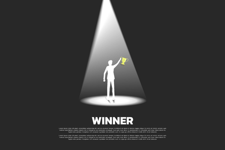 Silhouette of businessman with golden trophy in spotlight. business concept of winner and championのイラスト素材