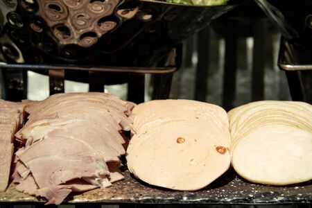 Slice of ham and cold cut. background concept for meat and foodの写真素材