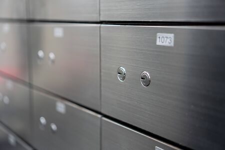 Metal safe box panel wall. Concept for sucurity and banking protection.の写真素材