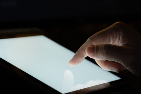 Finger touch on Tablet screen Mock up with light. Concept for mobile phone technology and device.