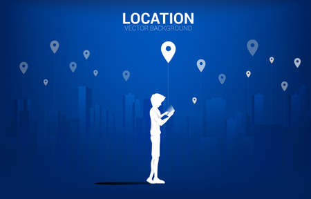 Silhouette of man with mobile and GPS icon with city background. concept of location and facility place , GPS technologyのイラスト素材
