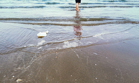 White foam box garbage on dirty beach. Concept for beach and ocean pollution and environment.
