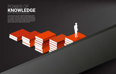 Concept background for power of knowledge. Silhouette of businessman move to cross wall with step from book stack.のイラスト素材