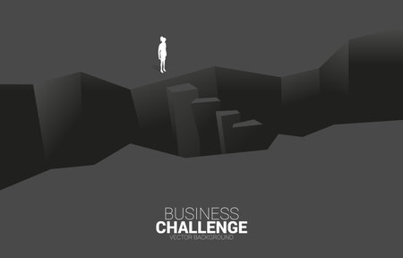 silhouette of businesswoman standing at valley. concept of business challenge and courage manのイラスト素材