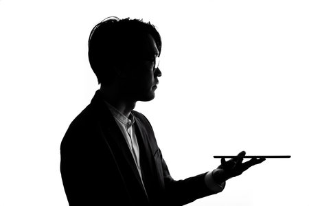Silhouette of businessman use tablet isolate on  white background. Concept for business and online...