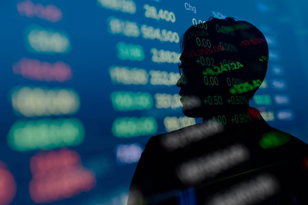 Double Exposure Silhouette of businessman with stock market pricelist. Concept for business and finactial economy.の写真素材