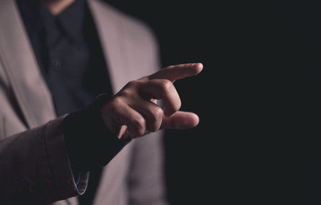 Close up hand of businessman with hand in the air. Concept of technoloy for business.