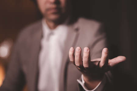 Close up hand of businessman with hand in the air. Concept of technology for business.の写真素材