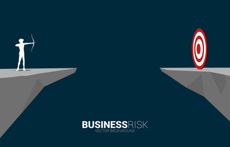 Businessman in suit shoot the arrow to target across the valley. Business Concept of marketing target and customer.のイラスト素材