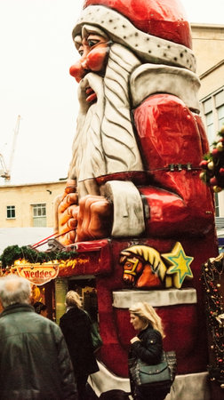 Bristol, UK - November 9, 2015:  A giant Santa in  the 7th German Christmas Market in Broadmead,...