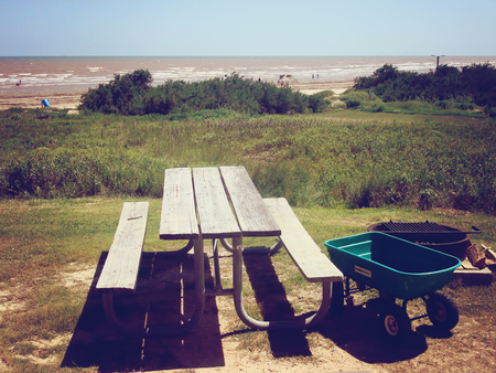 Quintana beach, Texas - July 30, 2010: sitting area outside the cabin in Quintana beach County Park close to Houston, Texasのeditorial素材