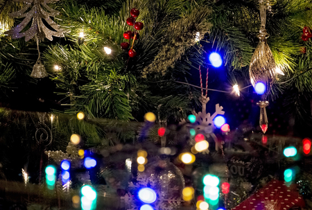 Christmas light decorations with the tree behindの写真素材