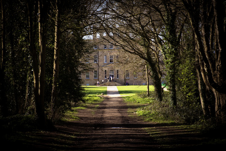Bristol, UK - April 02, 2017: Kings Weston House South East or Garden front entrance front across the lawns. Kings Weston House is a historic building in Bristol, England. It was built between 1712 and 1719 was designed by Sir John Vanbrugh.のeditorial素材