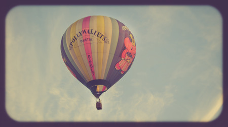 Bristol, UK - August 13, 2016: The Bristol International Balloon Fiesta 2016, showing the mass ascent and landings of over 100 balloons including special shapes and the 'night glow', where the burners are used at night to illuminate the balloons. This annのeditorial素材