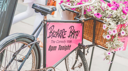 Bath Spa,UK-July 4,  2015: Tandem tricycle used to advertise Bizarre Bath, The Comedy Walk, Bathのeditorial素材