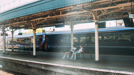 Bath Spa,UK-July 4, 2015: Waiting for a train on Bath Spa station platformのeditorial素材
