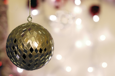 Christmas Holiday Background decorated with golden bauble.の写真素材