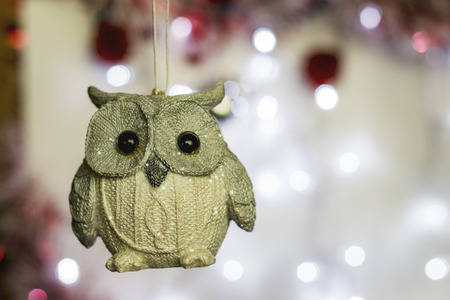 Christmas Holiday Background decorated with a silver owl decoration.の写真素材