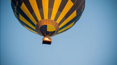 Bristol, UK - August 13, 2016: The Bristol International Balloon Fiesta 2016, showing the mass ascent and landings of over 100 balloons including special shapes and the 'night glow', where the burners are used at night to illuminate the balloons. This annのeditorial素材