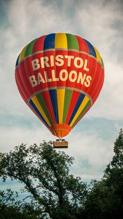 Bristol, UK - August 13, 2016: The Bristol International Balloon Fiesta 2016, showing the mass ascent and landings of over 100 balloons including special shapes and the 'night glow', where the burners are used at night to illuminate the balloons. This annのeditorial素材
