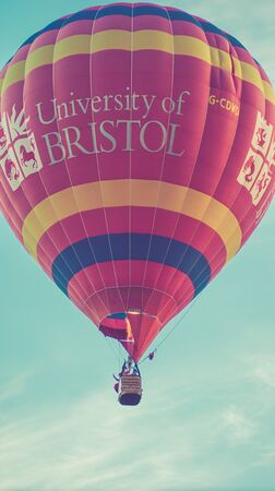 Bristol, UK - August 13, 2016: The Bristol International Balloon Fiesta 2016, showing the mass ascent and landings of over 100 balloons including special shapes and the 'night glow', where the burners are used at night to illuminate the balloons. This annのeditorial素材