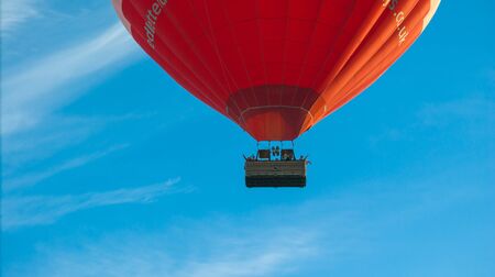 Bristol, UK - August 13, 2016: The Bristol International Balloon Fiesta 2016, showing the mass ascent and landings of over 100 balloons including special shapes and the 'night glow', where the burners are used at night to illuminate the balloons. This annのeditorial素材