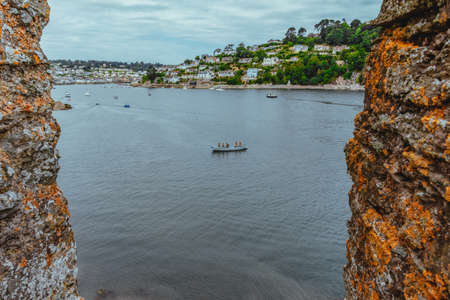 View from Dartmouth castle at Dartmouth Harbor and Kingswear at the River Dart. The Castle is an artillery fort, built to protect Dartmouth harbourのeditorial素材
