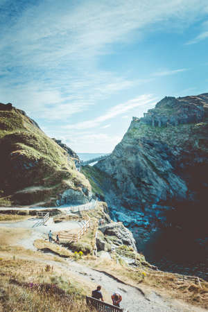 Tintangel, North Cornwall, England - July 24,2018: The cliff path leading to Tintagel Castle  in Cornwallのeditorial素材