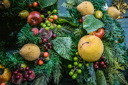Fruits garlands decorations. hristmas decorations on sale in a garden centre, near Lacock, England