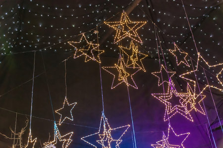 Christmas lights. Christmas decorations on sale in a garden centre, near Lacock