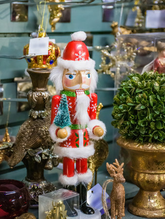 Nutcracker and Christmas decorations in a shop in UK. Christmas decorations on sale in a garden...