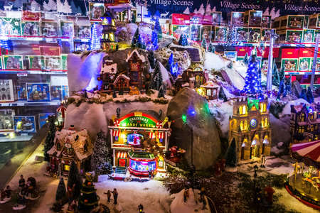 Lacock, Chippenham, UK - December 16, 2018: Christmas village scenes.  Christmas decorations on sale in Whitehall garden centre, near Lacock in Wiltshire,  England.のeditorial素材