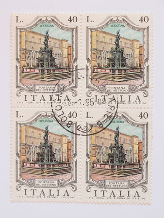 ITALY - CIRCA 1974  mail stamp released in Italy to commemorate the 400th anniversary of the Fontana del Nettuno  Neptune fountain  designed by Giambologna in Bolognaのeditorial素材