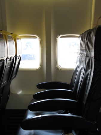 VIENNA, CIRCA SEPTEMBER 2014: row of seats in the interiors of an aircraft of the Ryan Air companyのeditorial素材