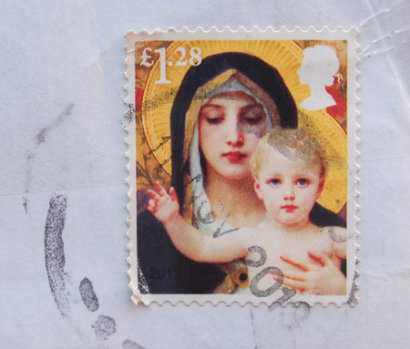 LONDON, UK - CIRCA 2012 - St Mary and Child on a stampのeditorial素材