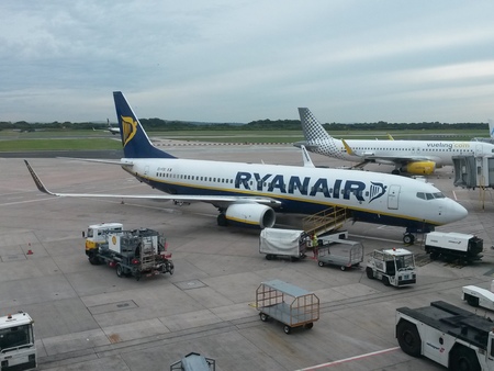 MANCHESTER, UK - CIRCA AUGUST 2015: Rayanair aircraft parked at Manchester airport. Manchester airport is one of the busier airports in the world, with thousands of passengers every dayのeditorial素材