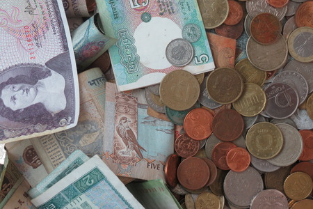 Mixed currency from Europe, especially Euro coins, and other countries such as Hungary, Serbia, Indiaの写真素材