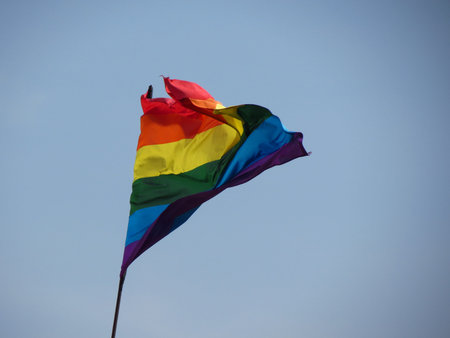 Gay, lesbian, bisexual, transgender pride flag floating in the air