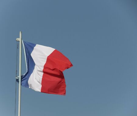 The French national flag of France, Europe, floating in the airの写真素材