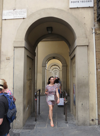 FLORENCE, ITALY - CIRCA JULY 2016: Ponte Vecchio meaning Old Bridge over Arno River with touristsのeditorial素材