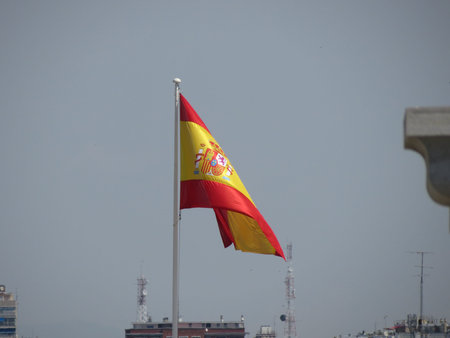 Spanish flag from Spain floating in the airの写真素材