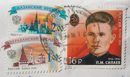 MOSCOW, RUSSIA - CIRCA JANUARY 2017: stamps printed by Russia showing traditional architecture and Pavel Silaev (1916-1942)のeditorial素材