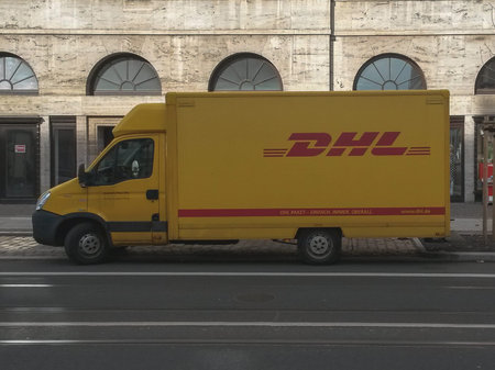 LEIPZIG, GERMANY - CIRCA MARCH 2016: DHL post van parked on the street
