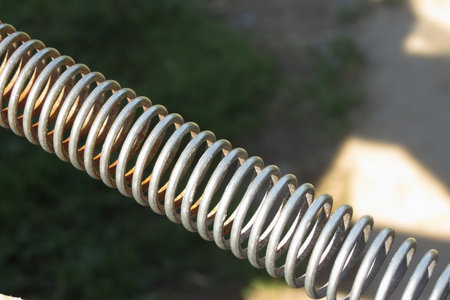 detail of a metal spring device outdoors