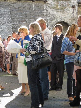 TALLINN, ESTONIA - CIRCA JUNE 2012: elegantly dressed people at a graduation ceremonyのeditorial素材