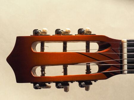 head of an acoustic guitar aka folk guitar string music instrumentの写真素材