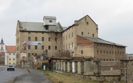 TEREZIN, CZECH REPUBLIC - CIRCA MARCH 2015: old abandoned factory by the riverのeditorial素材