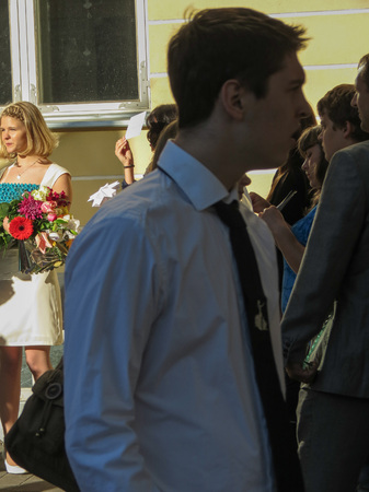 TALLINN, ESTONIA - CIRCA JUNE 2012: elegantly dressed people at a graduation ceremonyのeditorial素材
