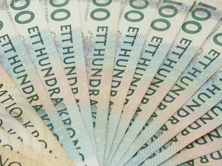 Swedish currency SEK from Sweden over blue background