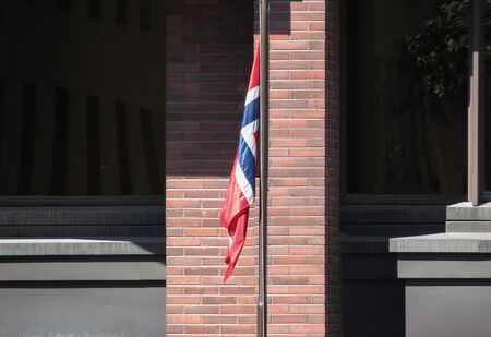 Norwegian flag from Norway floating in the airの写真素材